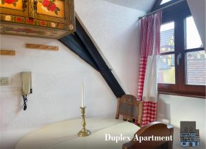 Appartements La Maison Bleue - Historic House in the Heart of Riquewihr : photos des chambres