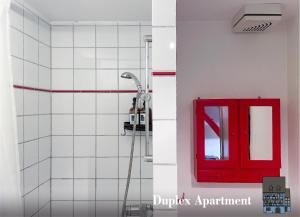 Appartements La Maison Bleue - Historic House in the Heart of Riquewihr : photos des chambres