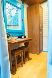 Campings Roulottes et son kota grill sauna : photos des chambres