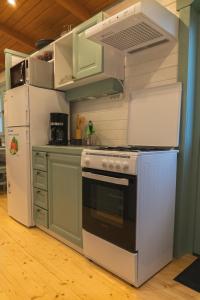 Campings Roulottes et son kota grill sauna : photos des chambres