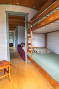 Campings Roulottes et son kota grill sauna : photos des chambres