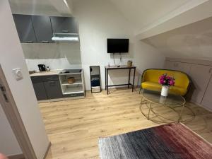 Appart'hotels Gites by Hotel Les Reflets Jaunes : photos des chambres