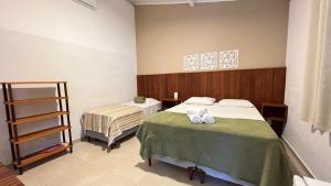 Suítes Curió - Passarim Hospedagem