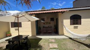 Suítes Curió - Passarim Hospedagem