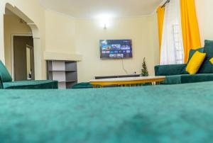 Riverside Haven 4BR Modern Home with Private Serene Compound