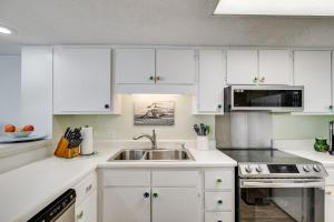 Walk to Beach Emerald Isle Condo with Ocean View!