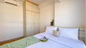 Spacious and Comfy 2BR Combined at Tokyo Riverside PIK 2 Apartment By Travelio