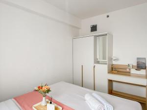 Good Place and Homey 2BR Bassura City Apartment near Mall By Travelio