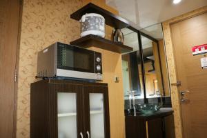 Minimalist and Comfort Studio No Kitchen at Gading Icon Apartment By Travelio