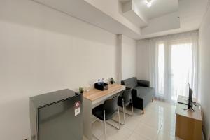 Comfort Living 1BR Boutique Kemayoran Apartment By Travelio