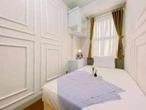 Good and Warm 2BR at Transpark Cibubur Apartment By Travelio