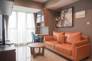 Cozy Stay and Minimalist 1BR at Branz BSD City Apartment By Travelio