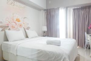 Luxurious Studio Room at Orchard Supermall Mansion Apartment By Travelio