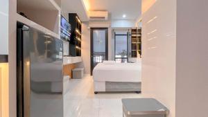 The Luxury Studio at Delft Ciputra Makassar Apartment By Travelio