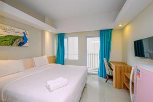 Homey and Nice Studio Bogor Icon Apartment By Travelio