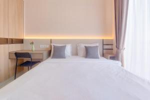 Cozy Living Studio at Sky House BSD Apartment By Travelio