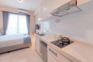 Cozy Living Studio at Sky House BSD Apartment By Travelio