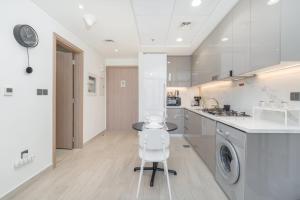 1 Bedroom and a Marvelous Flat in Azizi Riviera 26
