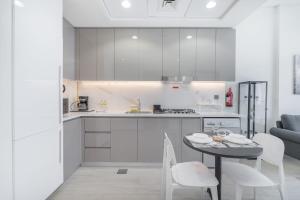 1 Bedroom and a Marvelous Flat in Azizi Riviera 26