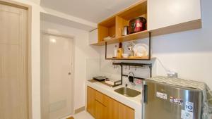 Cozy Living 2BR Apartment at Tokyo Riverside PIK 2 By Travelio