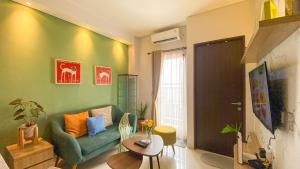 Homey and Good Place 2BR Transpark Bintaro Apartment By Travelio