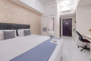 Comfy and Well Furnished Studio Casa de Parco Apartment By Travelio