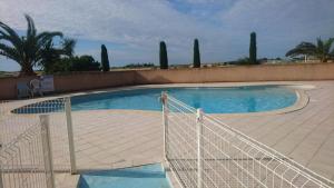 Maisons de vacances Le Moulin Maison Internet WiFi Parking Terrasse Residence avec Piscine : photos des chambres