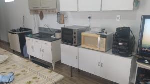 Casa de praia na pinheira, mar aberto, temporada