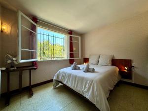 Appartements Maison Garriga : photos des chambres