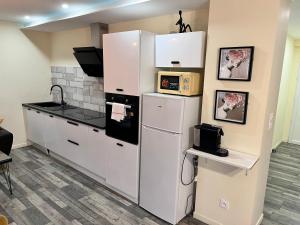 Appartements La Bonbonniere by Leslodgespa : photos des chambres