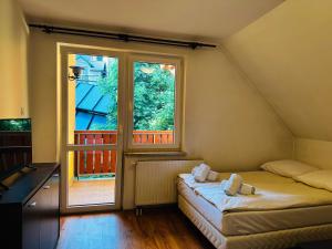 Nad Grajcarkiem domki i pokoje