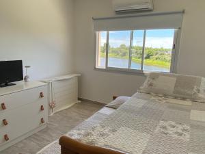 Casa en barrio privado en Escobar, laguna y pileta