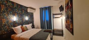 Hotels Hotel L'Etoile Aeroport - A61 : photos des chambres