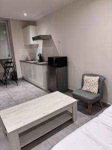 Appartements Studio en centre ville : photos des chambres