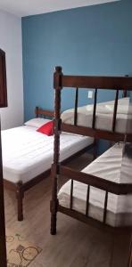 Próximo a Praia Grande, Apto com ar,garagem e Suíte