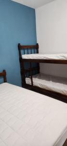 Próximo a Praia Grande, Apto com ar,garagem e Suíte