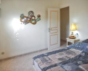 Villas Villa panoramique avec vue mer et montagne a Corbara : photos des chambres