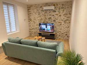 Appartements LE JEAN JAURES Arrivee Autonome : photos des chambres