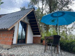 Encanto Verde cabaña sencilla