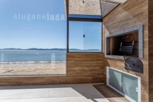 Casa pé na areia SC - Espaço completo