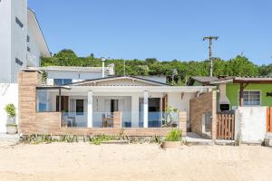 Casa pé na areia SC - Espaço completo