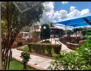 FLAT para Temporada perto SINGAPURA SHOPPING com 7 PISCINAS, Bar Molhado, Restaurante - A 3 min CENTRO DE CALDAS NOVAS!