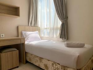 Comfort and Tidy 2BR at Cinere Bellevue Suites Apartment By Travelio
