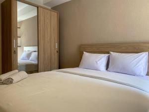 Comfort and Tidy 2BR at Cinere Bellevue Suites Apartment By Travelio