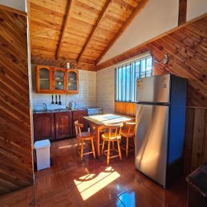 Cabañas y Tinajas Borde río