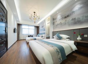 펑황 FenghuangQixin Guesthouse 호텔 스위트룸