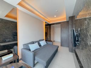 Well Furnished 1BR at Anderson Supermall Mansion Apartment By Travelio