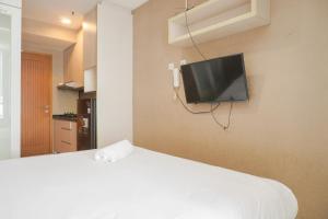 Warm and Cozy Studio at Cinere Bellevue Suites Apartment By Travelio