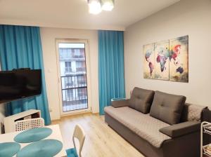 Apartament Kapitalny przy porcie w Kołobrzegu z rowerownią i placem zabaw