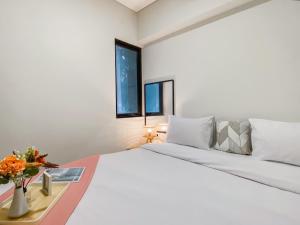 Well Furnished and Comfort 2BR Meikarta Apartment By Travelio